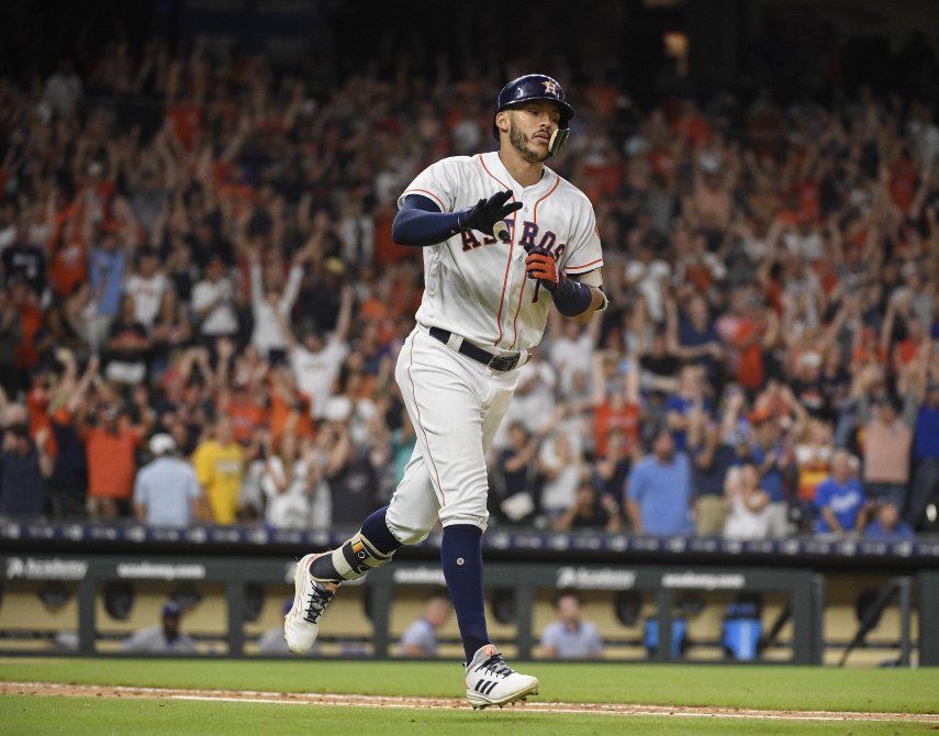 Correa define con hit en 12do inning para Astros ante Reales