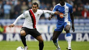 Inglaterra: Tripleta de Berbatov da victoria al Man United