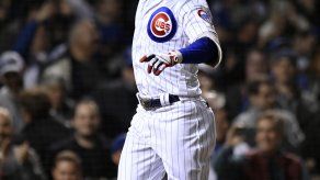 Con jonrones de Báez y Heyward