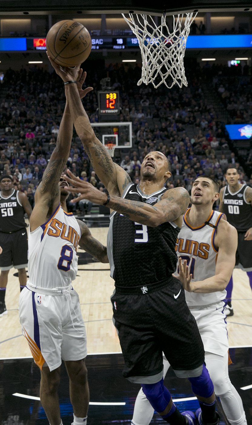 Hill anota 18 en su regreso, Kings derrotan a Suns 99-92