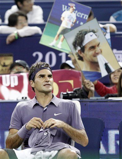 Federer toma clase de mandarí­n en Shanghai