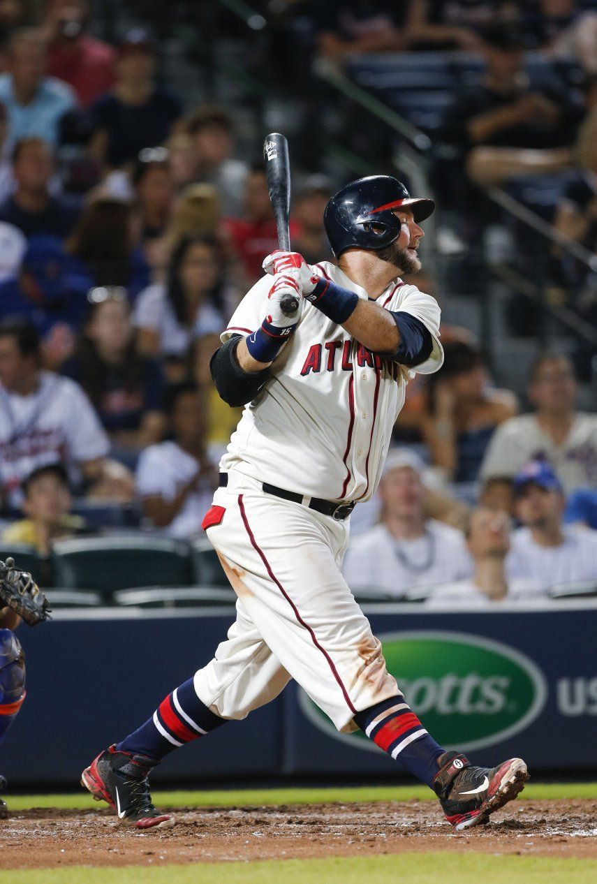 Bravos hunden a Mets, que pierden a dArnaud por lesión, image size:855x1266