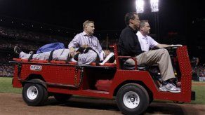 Receptor Olivo de Rockies lesionado mientras bateaba Pujols