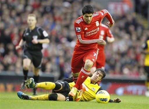 Suarez given 1-match ban for obscene gesture