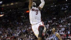 James y Wade llevan al Heat a victoria sobre Wizards