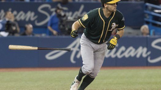 Con grand slam de Pinder, A’s remontan en el 8vo en Toronto
