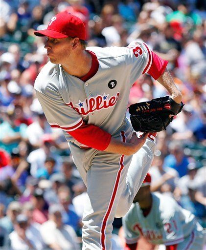 MLB: Filis 8, Rockies 6; Halladay llega a 14 triunfos