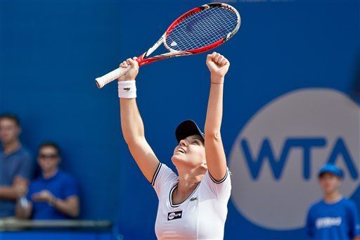 Halep beats Petkovic for 1st career WTA title