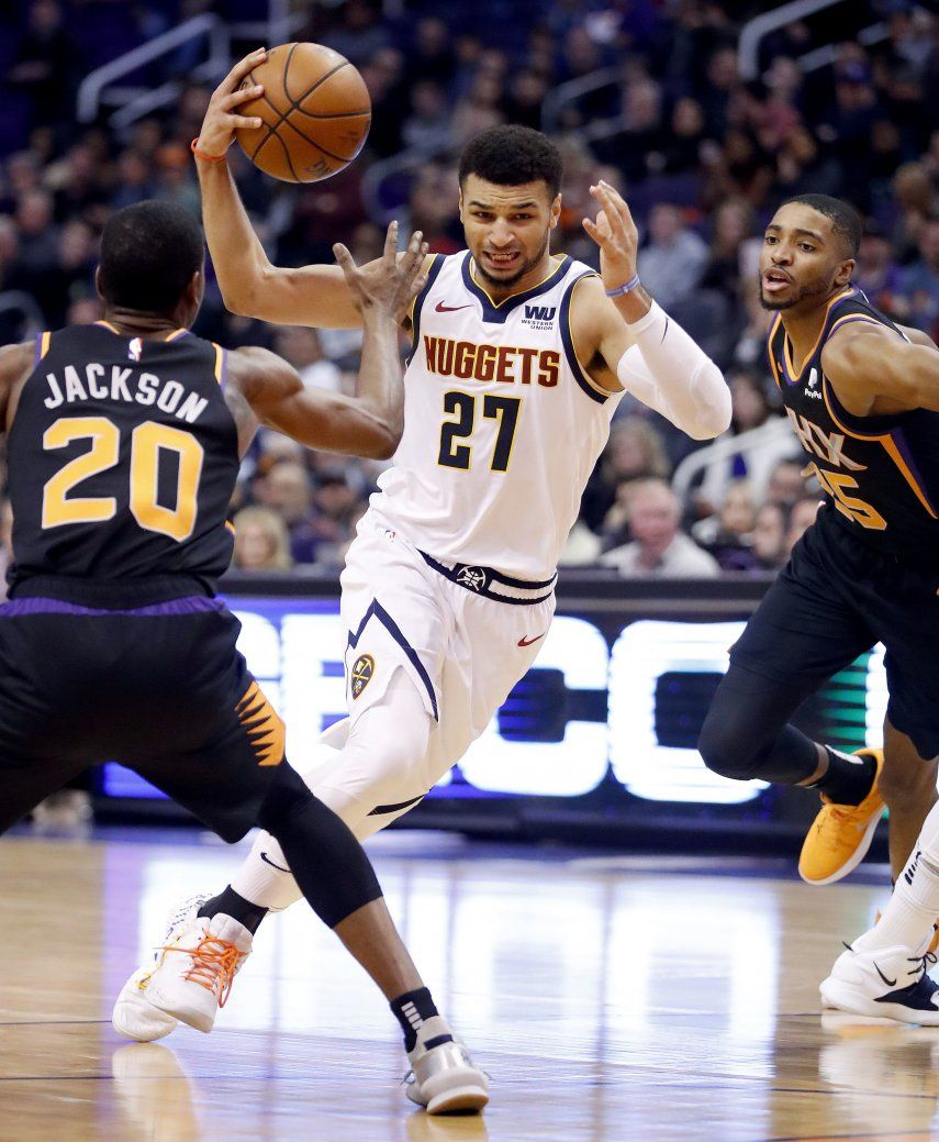 Murray y Nuggets ganan 122-118 a Suns