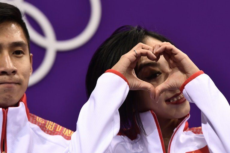 Los chinos Sui y Han lideran el programa corto de patinaje artístico por parejas