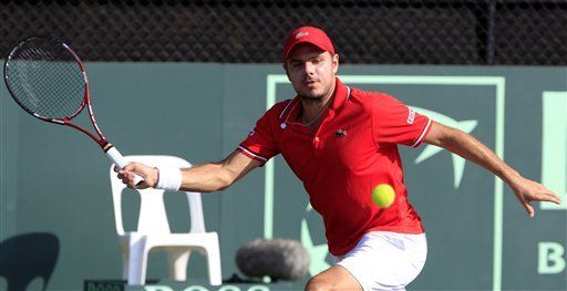 Davis: Suspenden Suiza-Australia por oscuridad