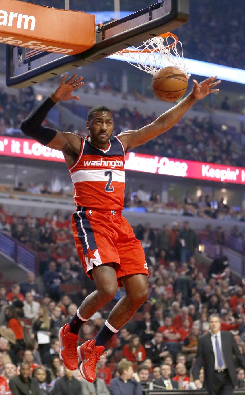 Wizards reaccionan y doblegan a Bulls
