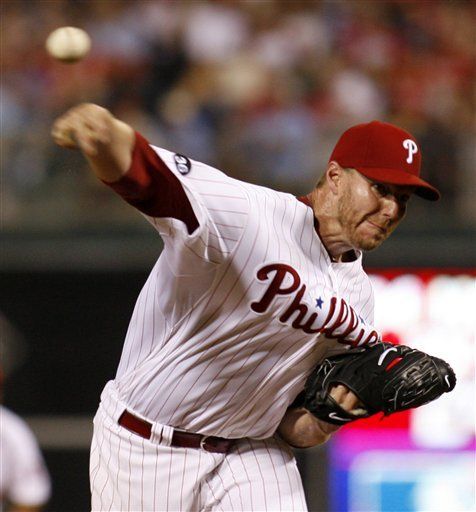 Halladay vuelve a lanzar partido completo y suma siete en el año