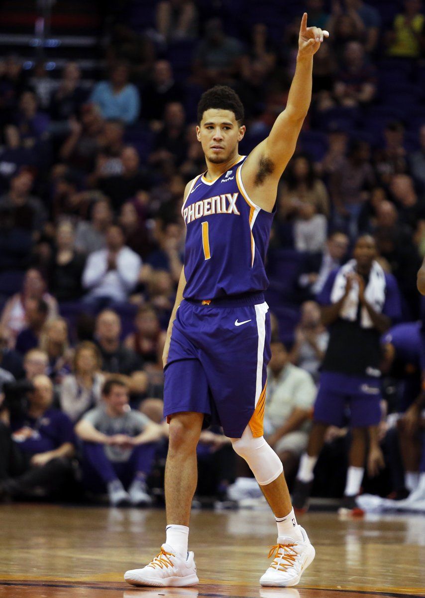 Booker logra enceste agónico; Suns superan a Grizzlies