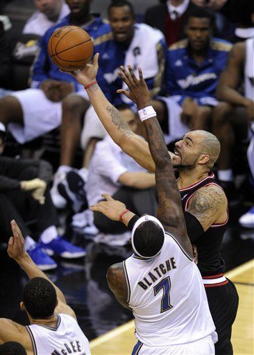 NBA: Bulls 87, Wizards 80, Boozer anota 30