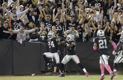 Pryor y Woodson dan triunfo a Raiders