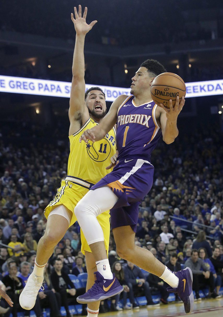 Booker y los Suns rompen racha de 19 derrotas ante Warriors
