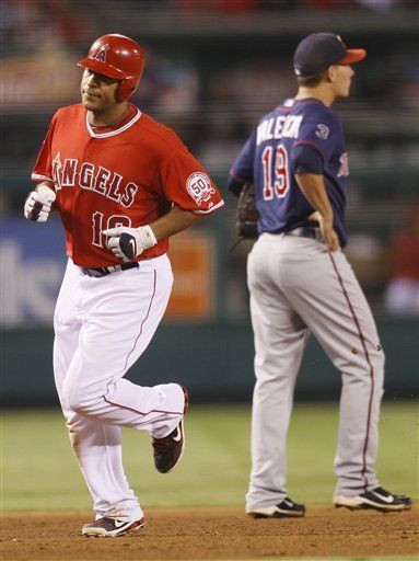 MLB: Angelinos 10, Mellizos 6; Wells y Trumbo jonronean