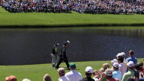 Masters: Poulter se mantiene primero