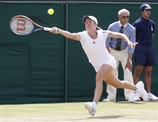 Clijsters y Henin avanzan a la tercera rueda en Wimbledon