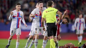 Robert Lewandowski y Gerard Piqué del Barcelona fueron sancionados