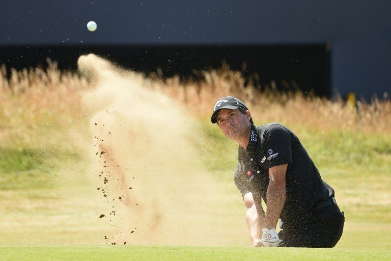 Kisner empieza como líder del Abierto Británico, Tiger Woods en el par