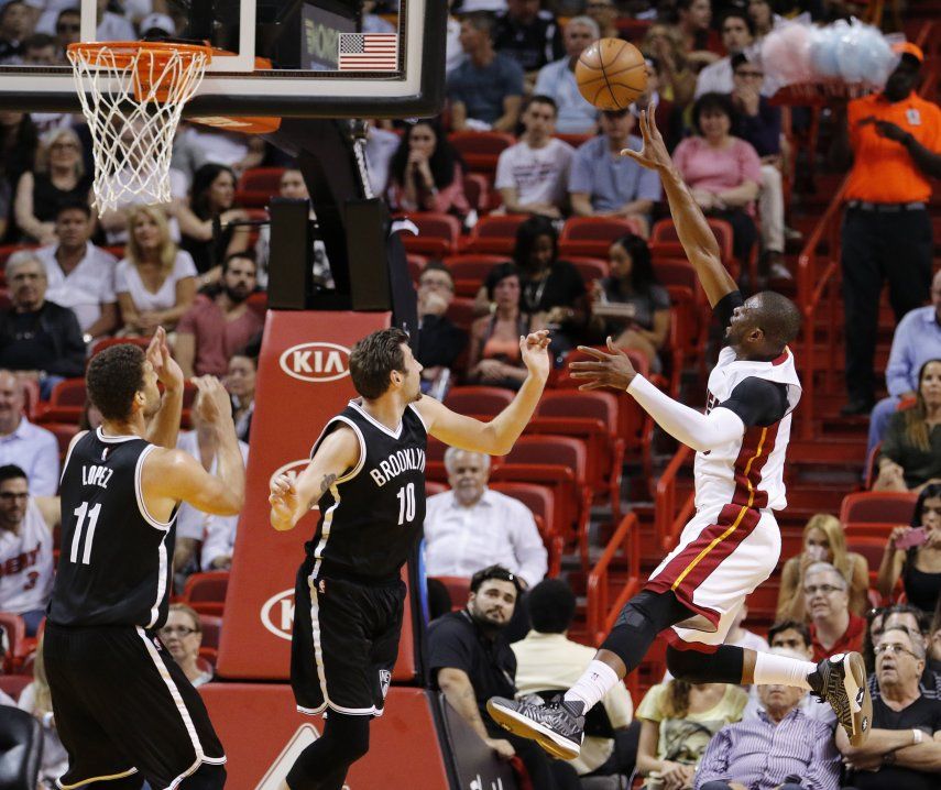 Con 30 de Wade, el Heat supera a los Nets