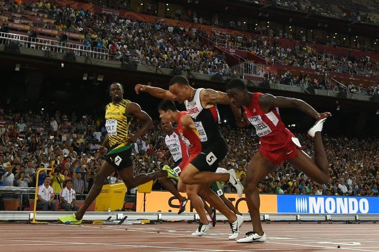 Bolt y Gatlin pasan a la final de 100 metros en Pekín