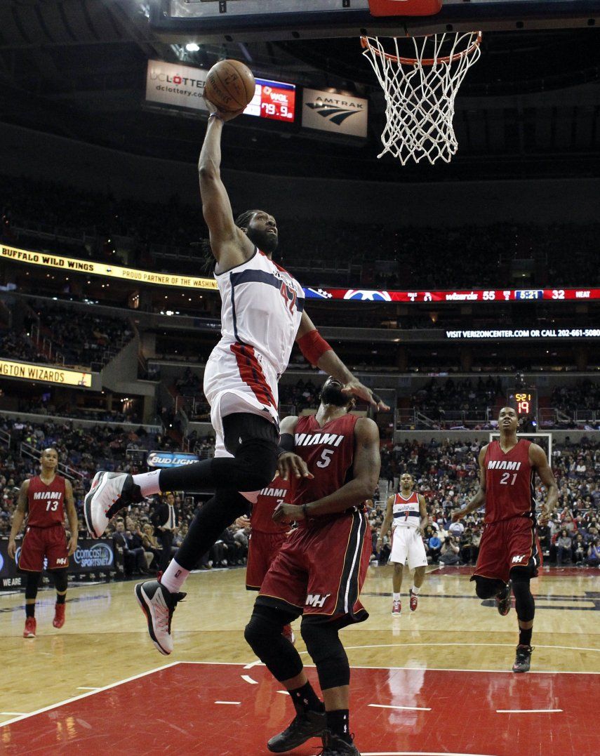 Wizards contienen arremetida del Heat para reñido triunfo