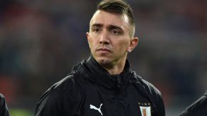 Muslera vuelve a Uruguay enfocado en eliminatorias: la Copa América se está por ver