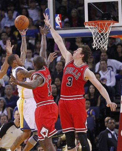 NBA: Warriors 99, Bulls 91; Curry guí­a a Warriors sobre Bulls