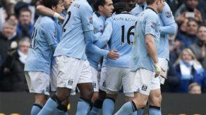 Tevez y Toure dan la victoria a Manchester City