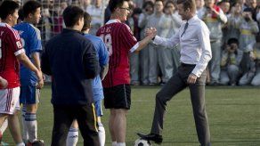 Beckham visita China