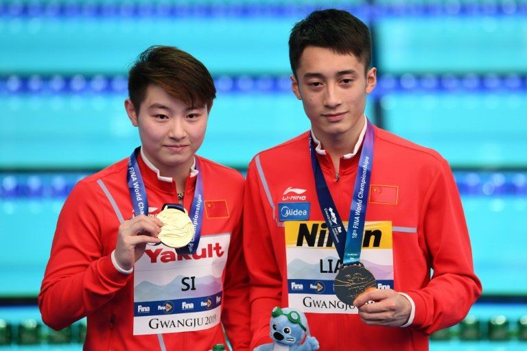 Dos chinos ganan clavados mixtos sincronizados en mundial, los mexicanos llevan el bronce