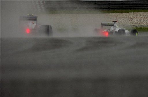 F1: La lluvia acorta el GP de Malasia, nueva victoria para Button