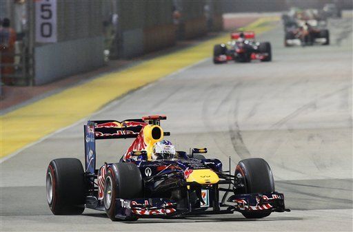 Vettel gana el Gran Premio de Singapur, pero no el tí­tulo todaví­a