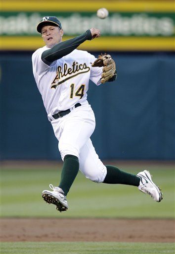 Rockies adquieren al veterano Ellis, de los Atléticos