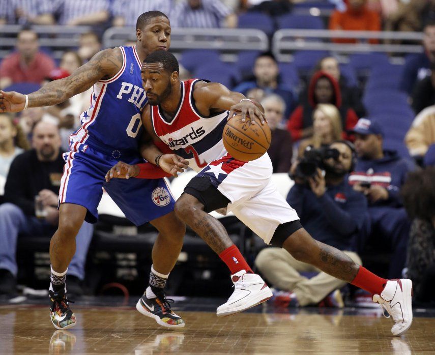 Con triple doble de Wall, Wizards derrotan a 76ers