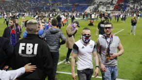 Lyon culpa a hooligans turcos por violencia en partido