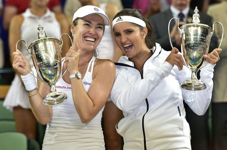Hingis se corona en los dobles de Wimbledon 17 años después