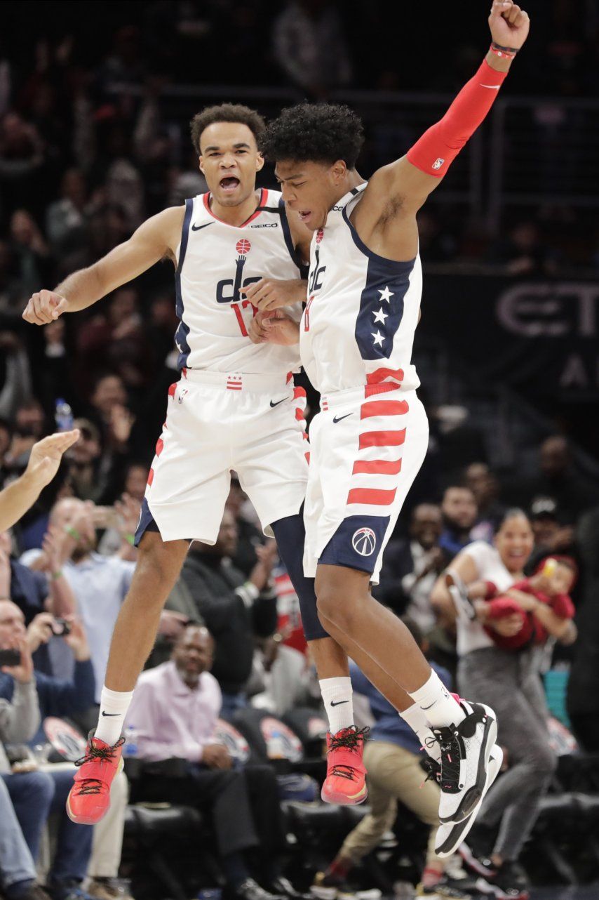 Triple de Robinson encamina a Wizards en triunfo ante Nets