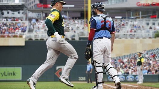 Con 2 jonrones de Chapman, Atléticos vencen a Mellizos