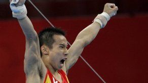 China gana el oro de equipos en gimnasia