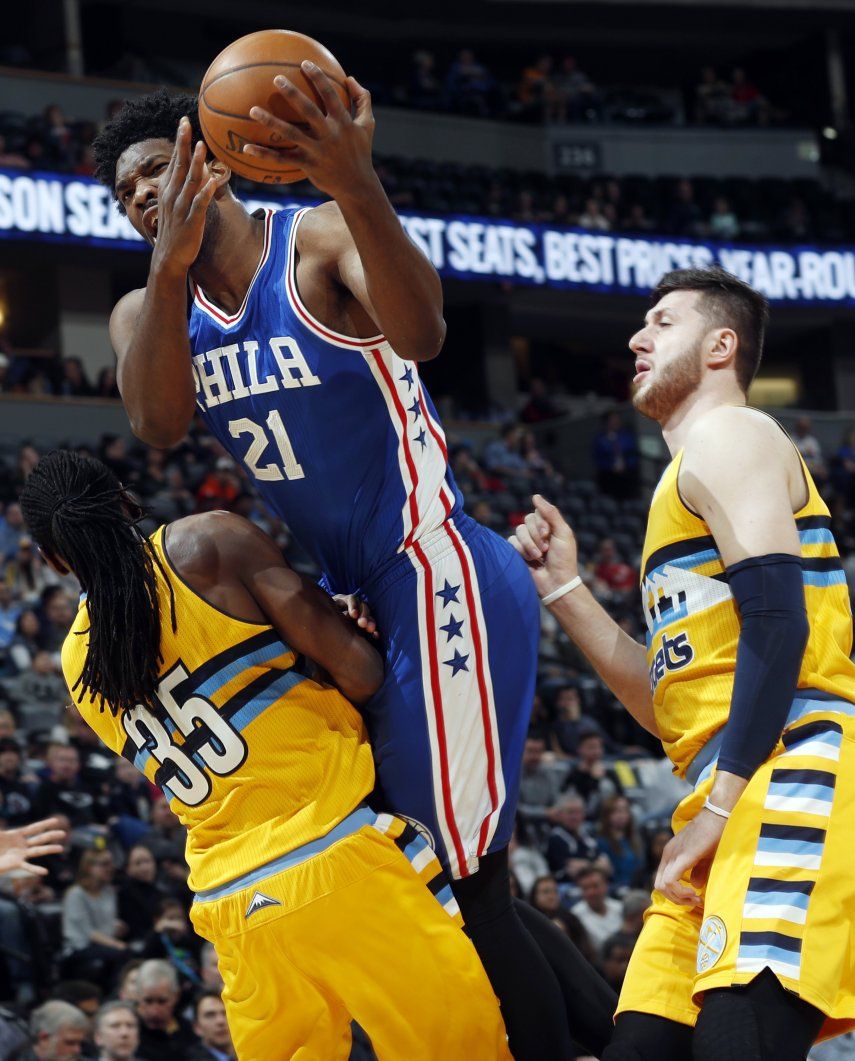 76ers survive late flurry to beat Nuggets 124-122