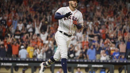 Correa define con hit en 12do inning para Astros ante Reales