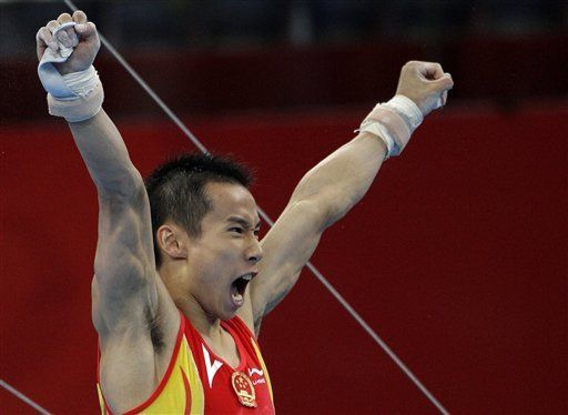 China gana el oro de equipos en gimnasia