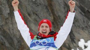 Invierno: Suizo Ammann gana primera medalla de oro